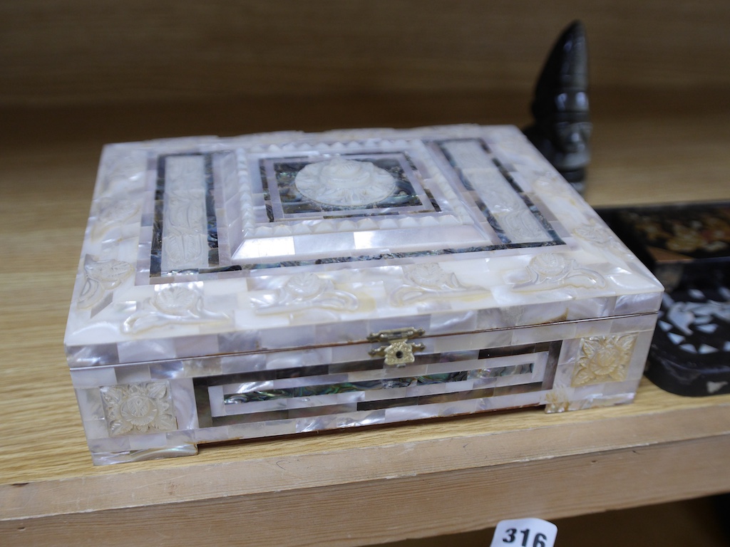 Sundry items comprising a pearl box, a papier mache tray, an inuit type carving and a papier mache box, 28cm wide. Condition - Varies